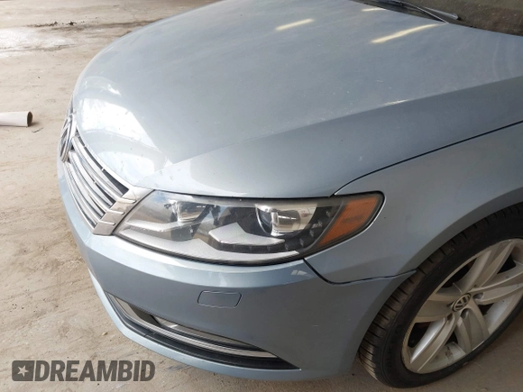 2013 Volkswagen CC Sport with VIN WVWBP7AN1DE567561, listed as a IAAI auction lot 42174906 with 157,827 mi miles. Bid and sale history available at carsss.com. Image 12.
