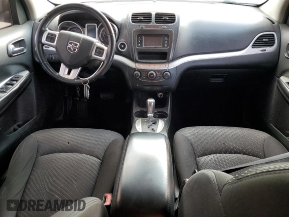 2015 Dodge Journey American Value with VIN 3C4PDCABXFT720583, listed as a Copart auction lot 52882515 with 173,575 mi miles and Salvage Title. Bid and sale history available at DreamBid. Image 8.
