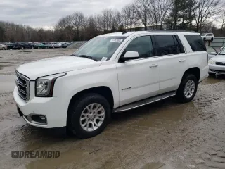 2015 GMC Yukon SLE with VIN 1GKS2AKC0FR107168, listed as a Copart auction lot 47882895 with 149,448 mi miles and Clean Title. Bid and sale history available at carsss.com. Image 1.