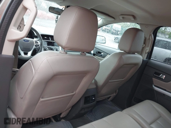2014 Ford Edge SEL z VIN 2FMDK4JC0EBA36381, wystawiony jako IAAI lot #42236973 z przebiegiem 146 053 mil mil oraz . Historia ofert i sprzedaży dostępna na DreamBid. Obrazek 19.