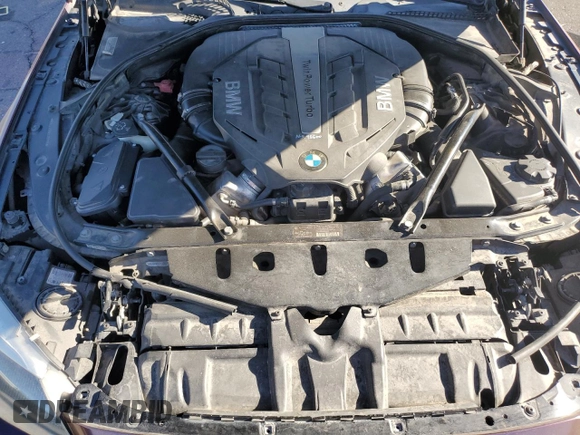 2012 BMW 6 Series 650i z VIN WBALZ3C50CC397706, wystawiony jako Copart lot #89402265 z przebiegiem 92 186 mil mil oraz Szkoda całkowita • Salvage title. Historia ofert i sprzedaży dostępna na DreamBid. Obrazek 11.