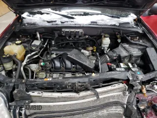 2005 Mercury Mariner Luxury z VIN 4M2YU57115DJ31385, wystawiony jako Copart lot #82533724 z przebiegiem 184 825 mil mil oraz Tytuł czysty. Historia ofert i sprzedaży dostępna na DreamBid. Obrazek 12.