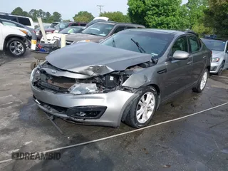 2013 Kia Optima EX z VIN 5XXGN4A71DG130926, wystawiony jako IAAI lot #42080433 z przebiegiem 197 900 mil mil oraz . Historia ofert i sprzedaży dostępna na DreamBid. Obrazek 2.