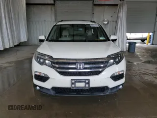 2018 Honda Pilot EX-L with VIN 5FNYF6H58JB040611, listed as a Copart auction lot 63614525 with 148,656 mi miles and Salvage title. Bid and sale history available at DreamBid. Image 5.