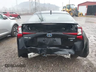 2021 Toyota Prius L Eco with VIN JTDKAMFU5M3145210, listed as a IAAI auction lot 41482234 with 85,600 mi miles and . Bid and sale history available at DreamBid. Image 17.