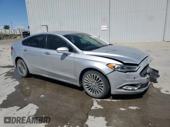 2018 Ford Fusion Titanium z VIN 3FA6P0D96JR155318, wystawiony jako Copart lot #53740505 z przebiegiem 86 567 mil mil oraz Szkoda całkowita • Salvage title. Historia ofert i sprzedaży dostępna na DreamBid. Obrazek 4.