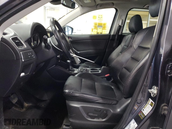 2016 Mazda CX-5 Grand Touring with VIN JM3KE4DY8G0616421, listed as a Copart auction lot 50884525 with 182,048 mi miles and Salvage Title. Bid and sale history available at DreamBid. Image 7.
