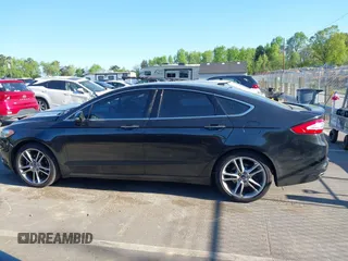 2013 Ford Fusion Titanium with VIN 3FA6P0K99DR374510, listed as a IAAI auction lot 42050026 with 133,227 mi miles and . Bid and sale history available at DreamBid. Image 15.