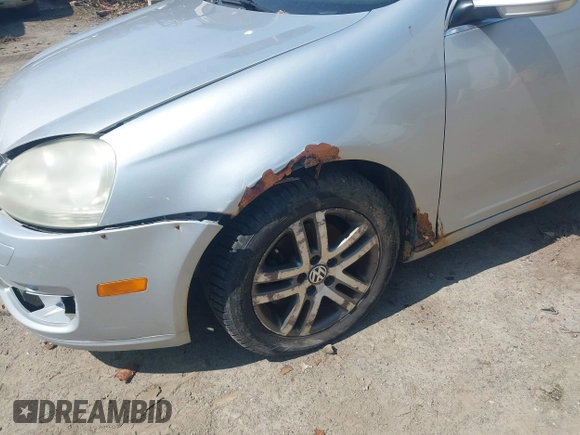 2006 Volkswagen Jetta 2.5L z VIN 3VWRF71K76M707615, wystawiony jako IAAI lot #42070579 z przebiegiem 180 873 mil mil oraz . Historia ofert i sprzedaży dostępna na DreamBid. Obrazek 6.