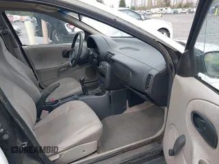 1997 Saturn SL with VIN 1G8ZF5283VZ400170, listed as a IAAI auction lot 41884490 with 171,635 mi miles. Bid and sale history available at carsss.com. Image 5.