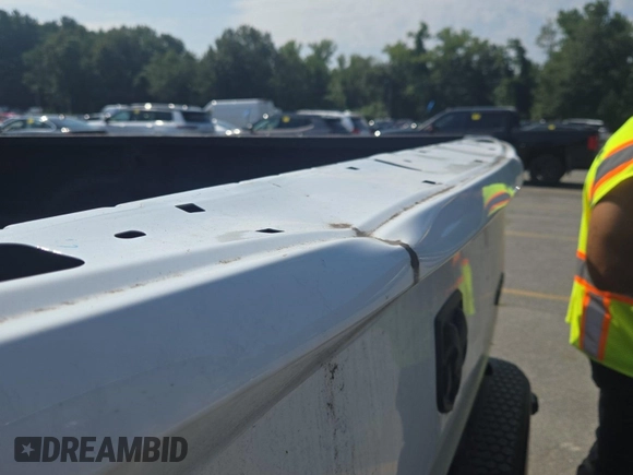 2022 Ram 1500 Tradesman with VIN 3C6JR7DG7NG276051, listed as a IAAI auction lot 42832410 with 29,141 mi miles and . Bid and sale history available at DreamBid. Image 27.