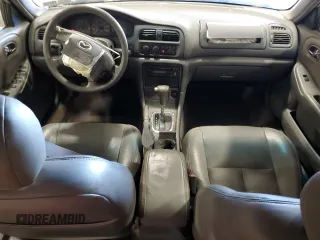 2000 Mazda 626 LX with VIN 1YVGF22C1Y5125842, listed as a Copart auction lot 45637895 with 84,487 mi miles and Salvage Title. Bid and sale history available at carsss.com. Image 8.