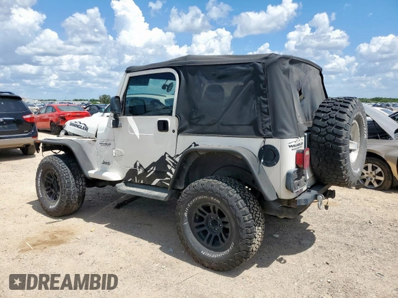 2004 Jeep Wrangler Sport z VIN 1J4FA49SX4P802341, wystawiony jako Copart lot #62752565 z przebiegiem 150 197 mil mil oraz Szkoda całkowita • Salvage title. Historia ofert i sprzedaży dostępna na DreamBid. Obrazek 2.