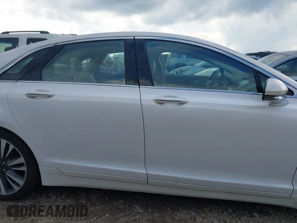 2019 Lincoln MKZ Reserve II z VIN 3LN6L5E94KR607412, wystawiony jako IAAI lot #42231994 z przebiegiem 54 812 mil mil oraz . Historia ofert i sprzedaży dostępna na DreamBid. Obrazek 13.