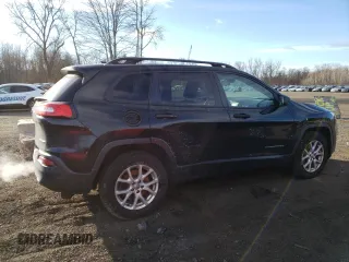 2016 Jeep Cherokee Altitude with VIN 1C4PJMAB9GW199835, listed as a Copart auction lot 87024904 with 128,429 mi miles and Salvage title. Bid and sale history available at DreamBid. Image 3.