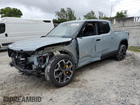 2022 Rivian R1T Launch Edition z VIN 7FCTGAALXNN004228, wystawiony jako Copart lot #43226985 z przebiegiem 4 mil mil oraz Szkody całkowita. Historia ofert i sprzedaży dostępna na DreamBid. Obrazek 1.