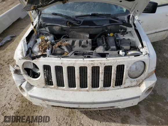 2010 Jeep Patriot Sport with VIN 1J4NF2GB2AD525475, listed as a Copart auction lot 51986785 with 90,659 mi miles and Salvage Title. Bid and sale history available at carsss.com. Image 12.