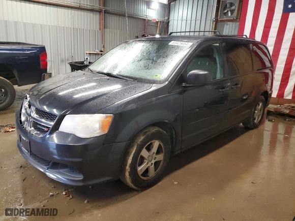2013 Dodge Grand Caravan SXT with VIN 2C4RDGCG8DR592059, listed as a Copart auction lot 83429054 with 184,866 mi miles and Salvage Title. Bid and sale history available at carsss.com. Image 1.