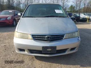 2002 Honda Odyssey LX z VIN 2HKRL18522H534580, wystawiony jako IAAI lot #41958266 z przebiegiem 176 441 mil mil oraz . Historia ofert i sprzedaży dostępna na DreamBid. Obrazek 6.
