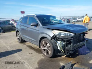 2016 Hyundai Tucson Limited with VIN KM8J33A22GU231834, listed as a IAAI auction lot 41312526 with 117,423 mi miles. Bid and sale history available at carsss.com. Image 1.