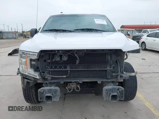 2018 Ford F-150 XL with VIN 1FTMF1CB4JKF54148, listed as a IAAI auction lot 42275439 with 157,811 mi miles and . Bid and sale history available at DreamBid. Image 13.