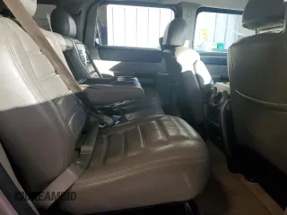 2003 Hummer H2 with VIN 5GRGN23U53H101713, listed as a Copart auction lot 85216034 with 189,549 mi miles and Non Repairable. Bid and sale history available at carsss.com. Image 12.
