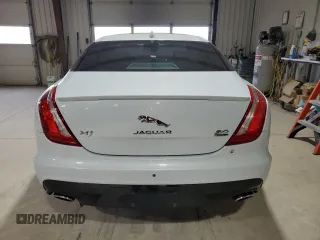2016 Jaguar XJ R-Sport with VIN SAJWJ1CDXG8W00145, listed as a Copart auction lot 49901234 with 76,629 mi miles and . Bid and sale history available at DreamBid. Image 6.