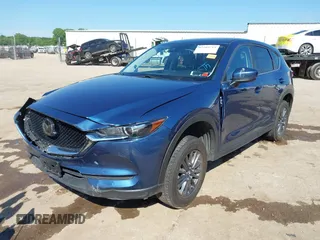 2020 Mazda CX-5 Touring z VIN JM3KFBCM2L0848233, wystawiony jako IAAI lot #42189719 z przebiegiem 80 893 mil mil oraz . Historia ofert i sprzedaży dostępna na DreamBid. Obrazek 2.