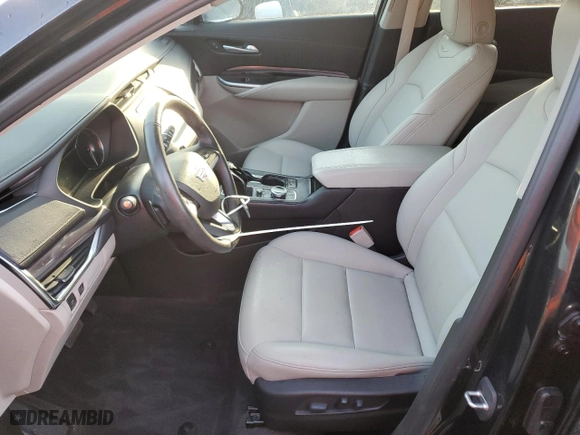 2022 Cadillac XT4 FWD Luxury with VIN 1GYAZAR40NF144779, listed as a Copart auction lot 75912804 with 9,805 mi miles and Non Repairable. Bid and sale history available at carsss.com. Image 7.