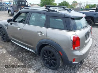 2018 MINI Countryman Cooper S with VIN WMZYT5C35J3D82204, listed as a IAAI auction lot 42836278 with 65,649 mi miles and . Bid and sale history available at DreamBid. Image 3.
