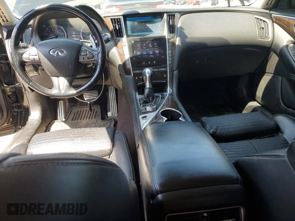 2014 Infiniti Q50 Premium with VIN JN1BV7AR8EM686789, listed as a Copart auction lot 53973905 with 130,695 mi miles and Salvage title. Bid and sale history available at DreamBid. Image 8.