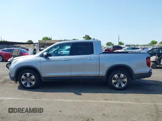 2019 Honda Ridgeline RTL-E with VIN 5FPYK3F79KB029771, listed as a IAAI auction lot 42448369 with 90,142 mi miles and . Bid and sale history available at DreamBid. Image 14.