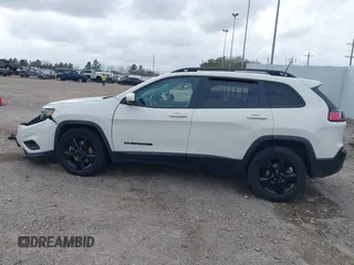2019 Jeep Cherokee Latitude Plus with VIN 1C4PJLLBXKD405322, listed as a IAAI auction lot 41708104 with 93,295 mi miles and . Bid and sale history available at DreamBid. Image 14.
