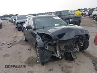 2014 Cadillac ATS Standard RWD with VIN 1G6AA5RA1E0108650, listed as a IAAI auction lot 42268622 with 99,703 mi miles and . Bid and sale history available at DreamBid. Image 1.