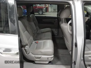 2015 Honda Odyssey EX-L with VIN 5FNRL5H66FB028822, listed as a IAAI auction lot 42067242 with 122,354 mi miles and . Bid and sale history available at carsss.com. Image 8.