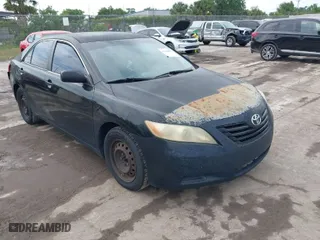 2007 Toyota Camry CE with VIN 4T1BE46K27U513940, listed as a IAAI auction lot 42108691 with 331,435 mi miles. Bid and sale history available at carsss.com. Image 1.