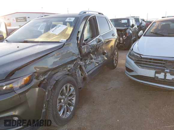 2019 Jeep Cherokee Latitude Plus with VIN 1C4PJLLN0KD164168, listed as a IAAI auction lot 41197248 with 118,278 mi miles and . Bid and sale history available at DreamBid. Image 6.