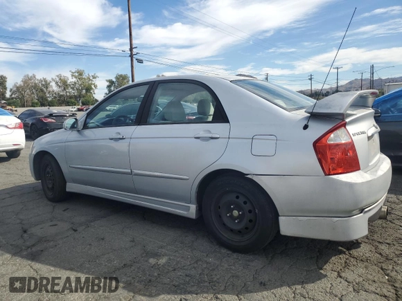 2006 Kia Spectra EX with VIN KNAFE122765228554, listed as a Copart auction lot 78458004 with 154,085 mi miles and Clean Title. Bid and sale history available at carsss.com. Image 2.