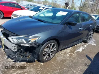 2016 Nissan Maxima SR with VIN 1N4AA6AP4GC419032, listed as a IAAI auction lot 41887138 with 164,208 mi miles and . Bid and sale history available at DreamBid. Image 2.