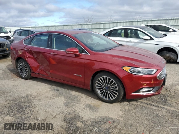 2018 Ford Fusion Hybrid Titanium with VIN 3FA6P0RU6JR177624, listed as a Copart auction lot 54309355 with 105,299 mi miles and Clean Title. Bid and sale history available at carsss.com. Image 4.