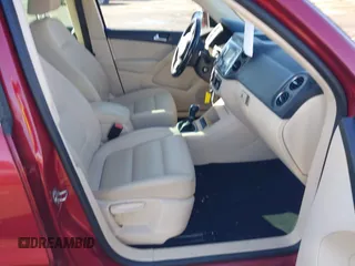 2012 Volkswagen Tiguan S with VIN WVGBV7AX2CW078629, listed as a IAAI auction lot 41332445 with 94,239 mi miles and . Bid and sale history available at DreamBid. Image 5.