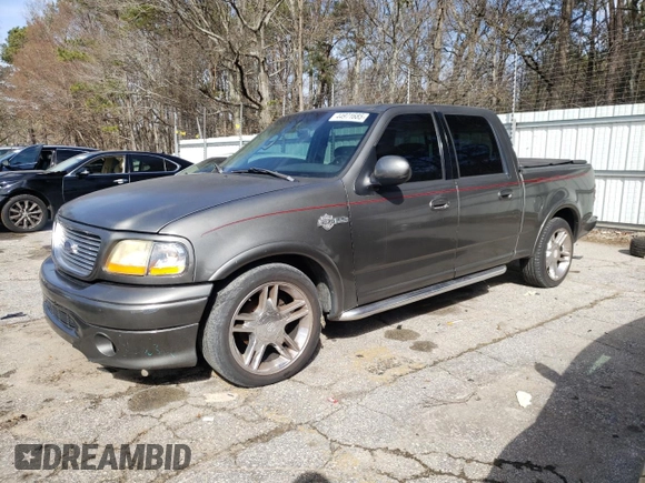 2002 Ford F-150 Harley Davidson with VIN 1FTRW07312KD72573, listed as a Copart auction lot 44971685 with 0 mi miles and Clean Title. Bid and sale history available at carsss.com. Image 1.