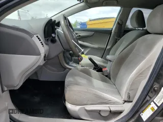 2010 Toyota Corolla with VIN 1NXBU4EE0AZ209169, listed as a Copart auction lot 53502225 with 214,412 mi miles and Salvage title. Bid and sale history available at DreamBid. Image 7.