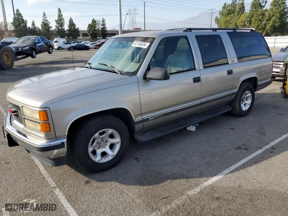 1999 GMC Suburban with VIN 3GKEC16R0XG526194, listed as a Copart auction lot 83740634 with 199583 miles and Clean Title. Bid and sale history available at carsss.com. Image 1.