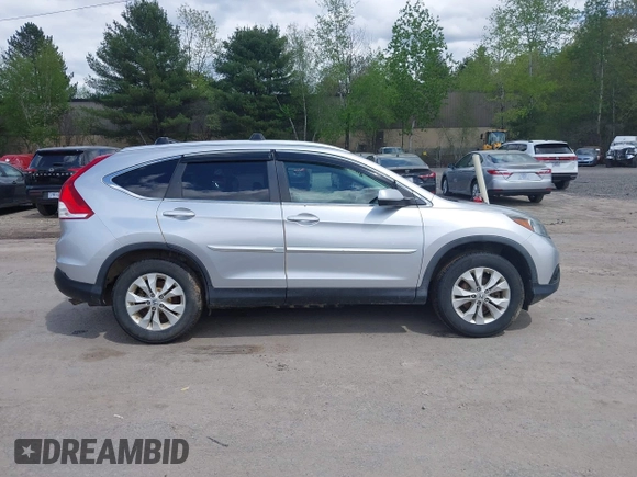 2012 Honda CR-V EX-L with VIN 2HKRM4H7XCH623122, listed as a IAAI auction lot 42204835 with 231,735 mi miles and . Bid and sale history available at carsss.com. Image 13.