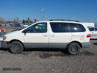 2000 Toyota Sienna LE with VIN 4T3ZF13C8YU256668, listed as a IAAI auction lot 41659040 with 387,876 mi miles. Bid and sale history available at carsss.com. Image 13.