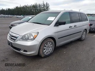 2005 Honda Odyssey LX with VIN 5FNRL382X5B029858, listed as a IAAI auction lot 41885727 with 228,607 mi miles. Bid and sale history available at carsss.com. Image 2.