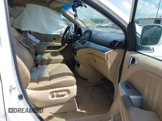 2008 Honda Odyssey Touring with VIN 5FNRL38858B006304, listed as a IAAI auction lot 41814309 with 208,778 mi miles. Bid and sale history available at carsss.com. Image 5.