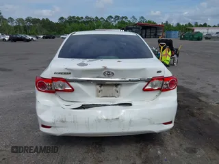 2012 Toyota Corolla L with VIN 5YFBU4EE5CP044613, listed as a IAAI auction lot 42113624 with 208,780 mi miles and . Bid and sale history available at carsss.com. Image 16.