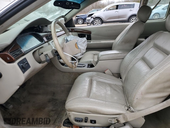 2000 Cadillac Eldorado with VIN 1G6EL12Y5YU166723, listed as a Copart auction lot 82612034 with 80,839 mi miles and Salvage title. Bid and sale history available at DreamBid. Image 7.